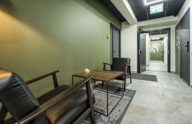 TopFloor Apartments - Photo 2