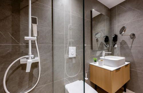 Unicos City Suites - Photo 24