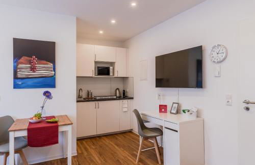 IMMOCITY Apartments - Foto 1