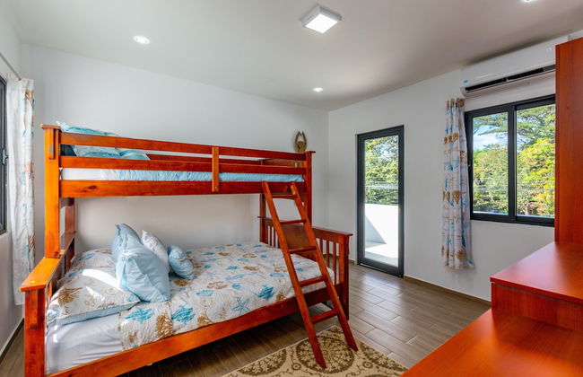 Ultramodern Townhome with an Inviting Coastal Design and Lush Outdoor Oasis with a Private Pool - Photo 8