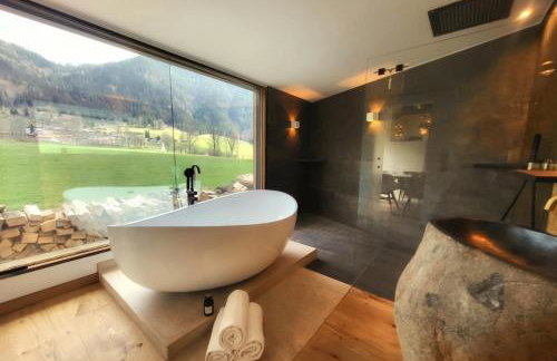 stylische Alpenlounge mit Pool, Blockhaus-Sauna und Jacuzzi für bis zu 12 Personen - Foto 31