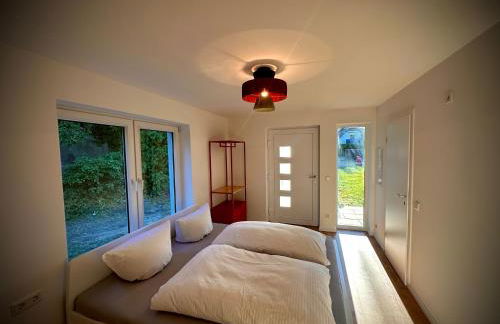 Stylisches See-Studio mit Badezugang & Garten - Photo 22