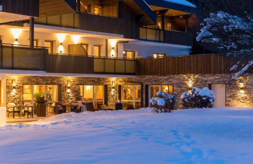 Aparthotel Familiaris - Family Apartments - Pools & Spa in Dolomites - Foto 46