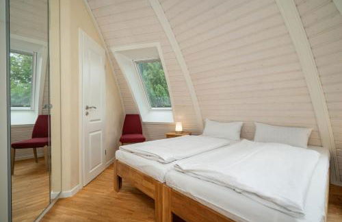 Kugelhaus Kia - Modernes Kugelhaus mit klarer Linie und Naturbezug am Tollensesee - Foto 14