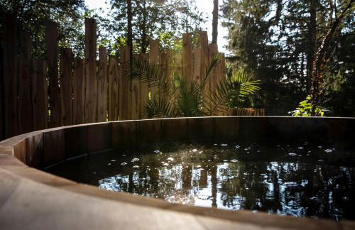 Bain de forêt - Lodges Cosy & Spa - Foto 11