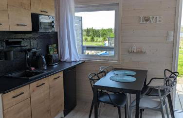 WIDOKI Rusinowo Domki Letniskowe - Foto 43