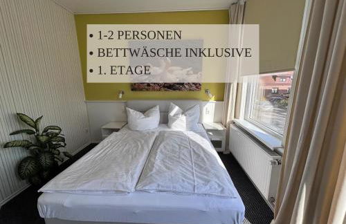 Haus Krabbe Apartments, zentral gelegen zwischen Bremerhaven und Cuxhaven, Hunde kostenfrei willkommen, hauseigene kostenfreie Parkplätze, Unterstellmöglichkeit für Fahrräder und E-Bikes - Foto 4