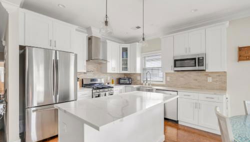 SkyHouse JC - New 3BR Apt with Private Rooftop - Foto 5, stove, dishwasher, pet friendly, toaster, minibar