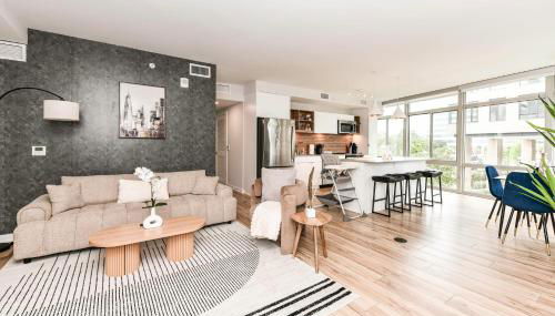 Posh 2BR Retreat Gym, Prkng and Scenic Rooftop - Photo 3