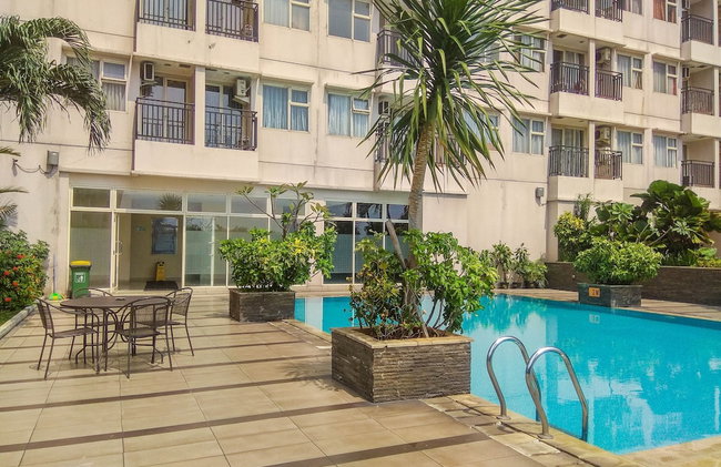 Good Homey and Simply Studio Margonda Residence 3 Apartment - Foto 16