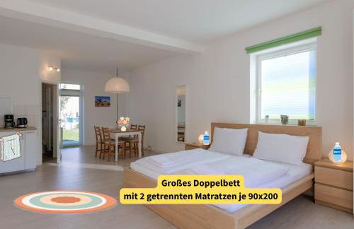 Holledau-Apartments - FeWo bis 5 Pers - getrennte Betten möglich - Vollausstattung - 24h Checkin - wöchentl Reinigung u Wäschewechsel - Waschmaschine u Trockner - WLAN - Minibar - XXL Parkplätze - Garten - ruhige Lage - Foto 35