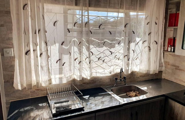 Secure Solar Powered two Bedroomed Haven - Photo 14