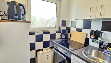 MR Living I modernes Apartment mit Einzelbetten, voll ausgestattete Küche, Balkon, WLAN, Parkplatz, ideal für Monteure I GI03 - Foto 2, stove