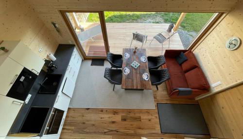 Zweistöckiges Natur-Holzhaus mit Berg- & Seesicht - Foto 2