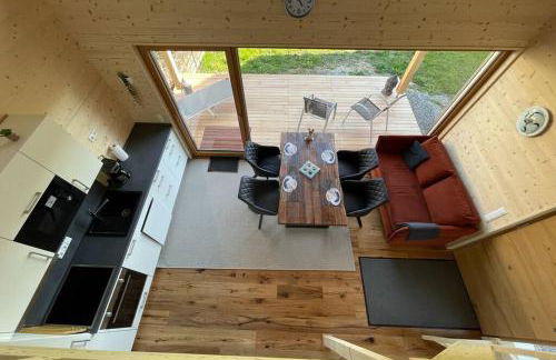 Zweistöckiges Natur-Holzhaus mit Berg- & Seesicht - Foto 2