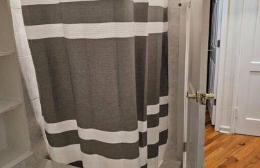 Comfy Getaway minutes from UBS Arena - Photo 16