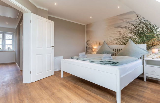 Doppelhaushalfte in Karolinenkoog - Foto 4