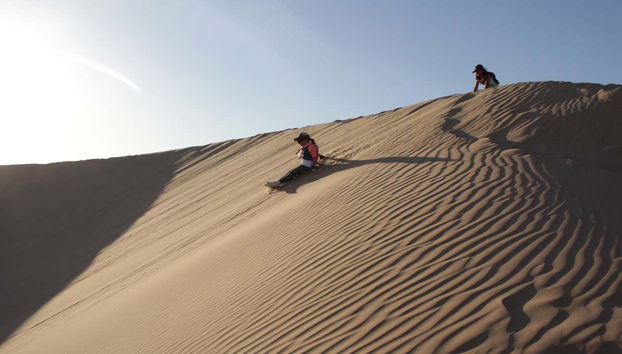 Ride down the dunes!