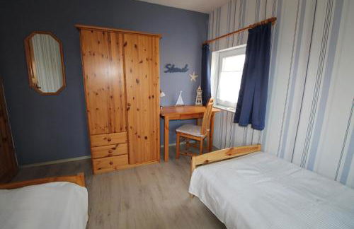 Böltser Hus Ferienwohnungen mit Strandkorb und Kamin 10 Gehminuten zum kurtaxefreien Sandstrand - Foto 39