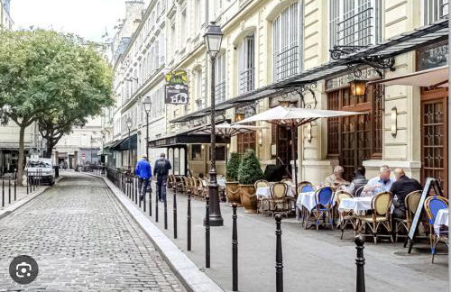Lovely Central Paris Apartment with Rooftop View - Foto 46