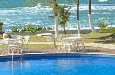Paraíso PÉ NA AREIA no coração do Litoral Norte - FRENTE MAR - Loft projetado para que você tenha a melhor experiência em hospedagem - condomínio mais procurado da Estrada do Côco - Varanda com vista espetacular para o mar - lazer e TRANQUILIDADE - Foto 7