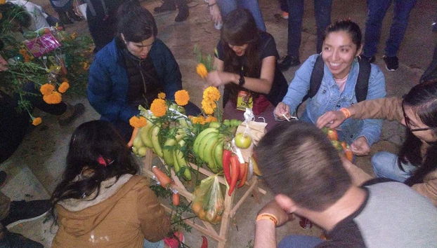 Preparing an offering for Day of the Dead