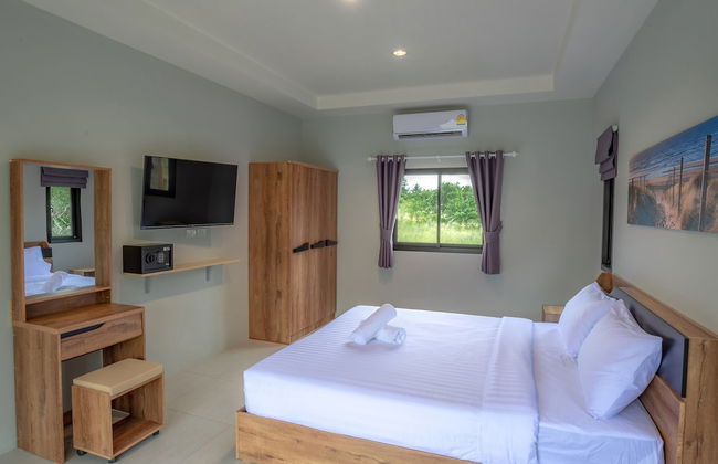 Malinee Resort - Photo 7