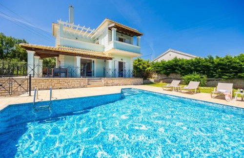 Villa Eleni Agios Stephanos - Photo 25