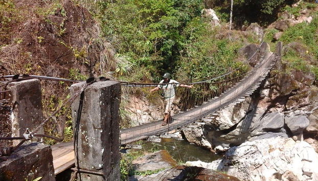 Crossing a bridge over the river