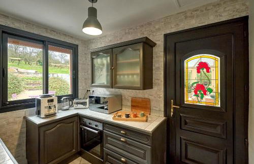 La Villa en Loire, avec Jacuzzi 6 places, Piscine chauffée, boulodrome, salle de jeu, 6 Chambres, vue Loire, 350M2 - Foto 41