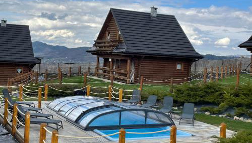 Domki Zagroda Domek z bala z basenem & sauna & balia z hydromasażem - Photo 1, sunbed