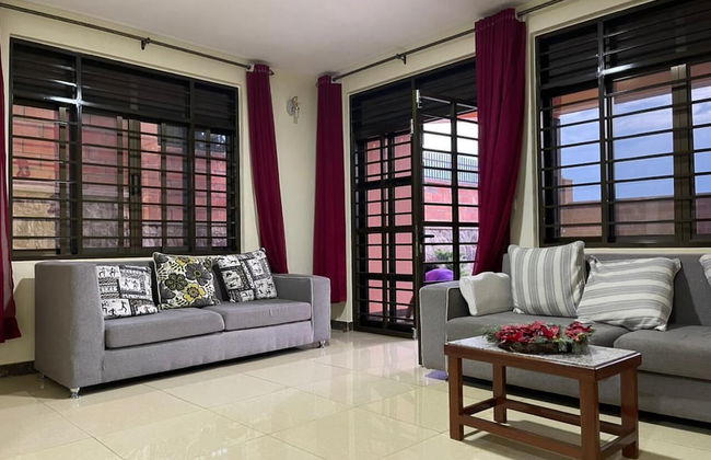 The Mugabi's Spacious Private Room - Foto 11