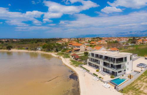 JamC Dream Familientraum direkt am Meer mit beheiztem Pool - Photo 31