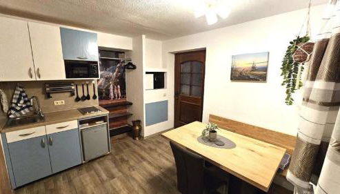 Ferienwohnung am Schloßbrunnen - Photo 2, stove