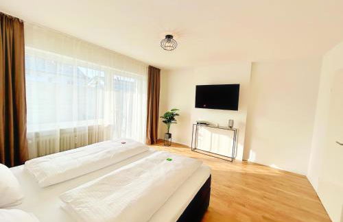 Basilisk Homes - in Grenzach-Wyhlen bei Basel - 4 x Moderne Fewos je 1bis2, 1bis4 oder 1bis6 Pers mit Küche und Balkon oder Terrasse - Parkplätze vorhanden - Foto 10