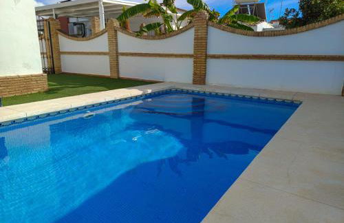 Chalet adosado con piscina privada en Mazagón - Foto 18