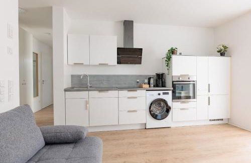 Modernes Apartment mit Terrasse & Garten, Parkplatz & 24h Self-Check-in - Foto 12