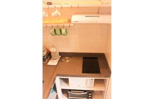 Casa d'Aroeira Residencial Boutique - Centro de Juqueí - Perto de Tudo - 2 quadras do Mar - Serviço de Praia - Roupa de Cama 600 fios algodão Egípcio - Tudo Novo - Estacionamento Interno - Cozinha - Consulte unidades com Ofurô Hidro e Cromoterapia - Foto 64