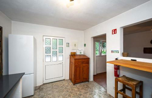 Cá Ficamos - T1 Hortacasa Portugal - Foto 9