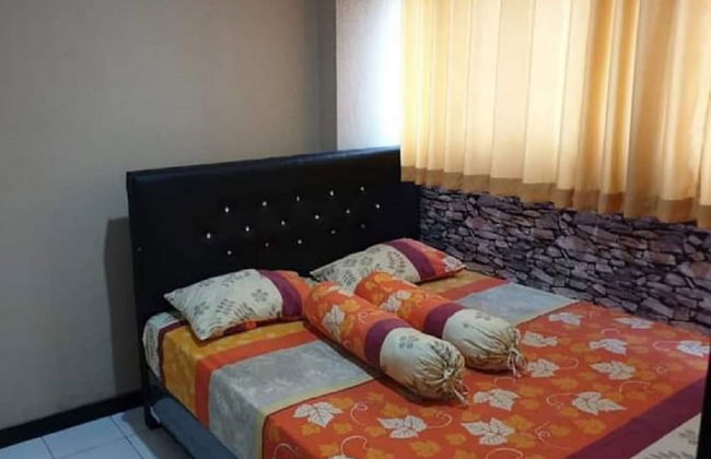 THE ROOMOS Hotel Apartemen - Foto 1