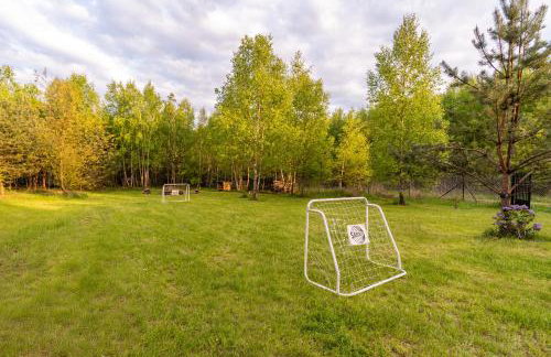 Sosnowy Raj domki nad rzeką Wkrą - Foto 55