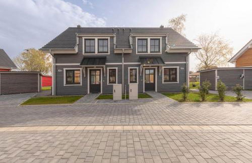 5 Sterne Ferienhaus Ostseetraum - 50m zum Strand - Ladestation für E-Auto - Foto 1