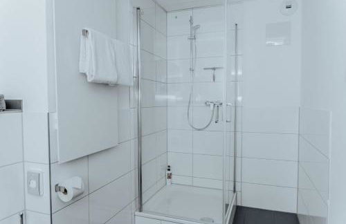 2-Zimmer City Apartment 57m² mit King Size Bett und Küche - Foto 18