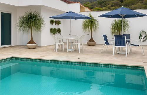 Casa Espaçosa com 5 Quartos Piscina Privativa 300m da Praia Ar condicionado em todos cômodos - Foto 2