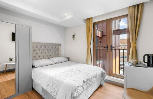 Ensuite Double Godino Hotel by Ilford Station - Foto 1