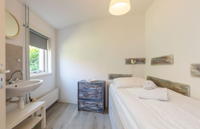 Cozy Holiday Home 3 Minutes From the Beach! - Photo 1