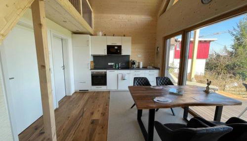 Zweistöckiges Natur-Holzhaus mit Berg- & Seesicht - Foto 3, minibar