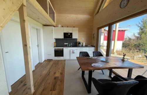 Zweistöckiges Natur-Holzhaus mit Berg- & Seesicht - Foto 3