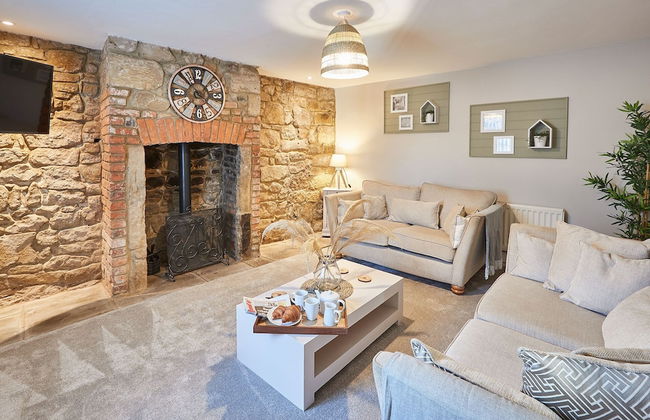 Host Stay Sion Hall Cottage - Foto 1