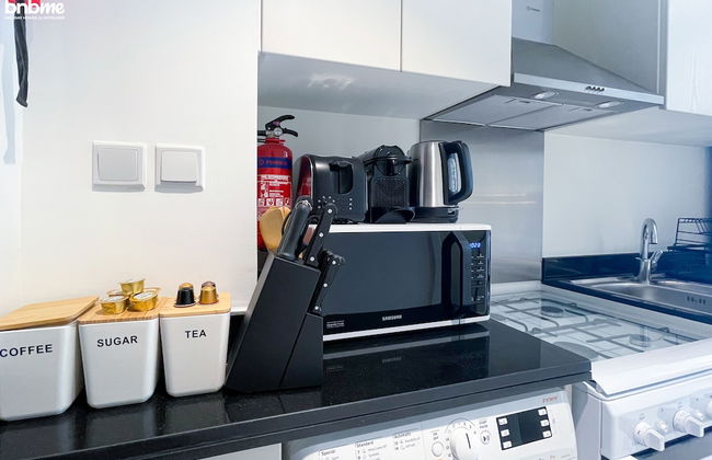 bnbme | Damac Hills Carson Tower | STUDIO - Photo 6